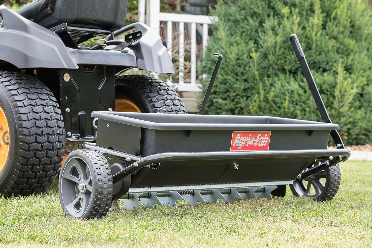 imageAgriFab 450543AMZ 100 lb TowBehind Lawn ampamp Garden SpikerSeederDrop Spreader for SeedFertilizer Salt Ice Melt Designed to Pull Behind Lawn ampamp Garden Tractors