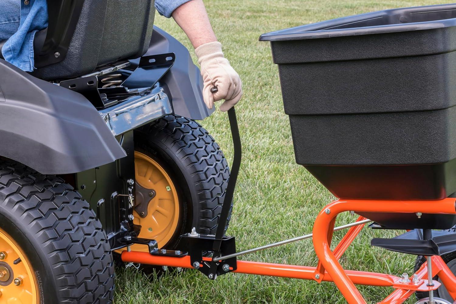 imageAgriFab 450547 185 lb TowBehind Lawn ampamp Garden Broadcast Spreader for SeedFertilizerSaltIce Melt Easy to use Flow Control from Seat of Riding Lawn Mower